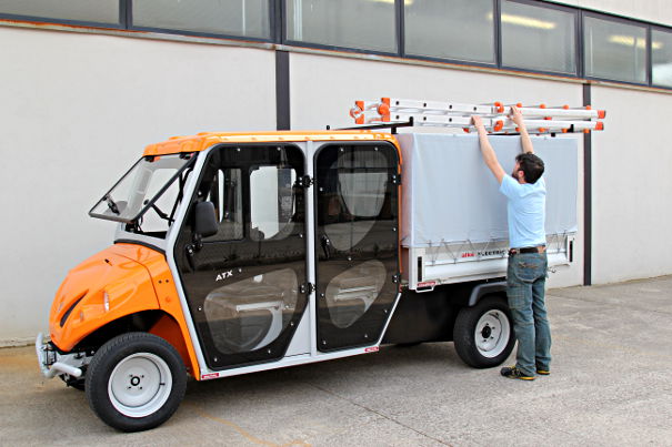 Electric vehicles with ladder holders