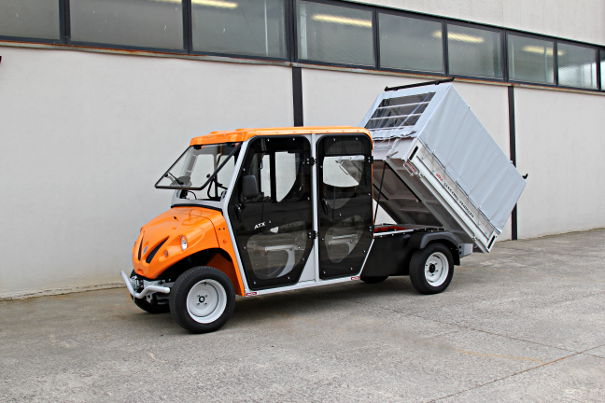 Double cab electric vehicles with tipping bin