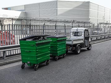 Towing of waste collection bins