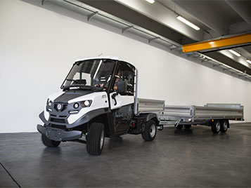 Towing vehicles with trailers