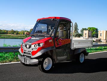 Electric utility vehicles with loading bed