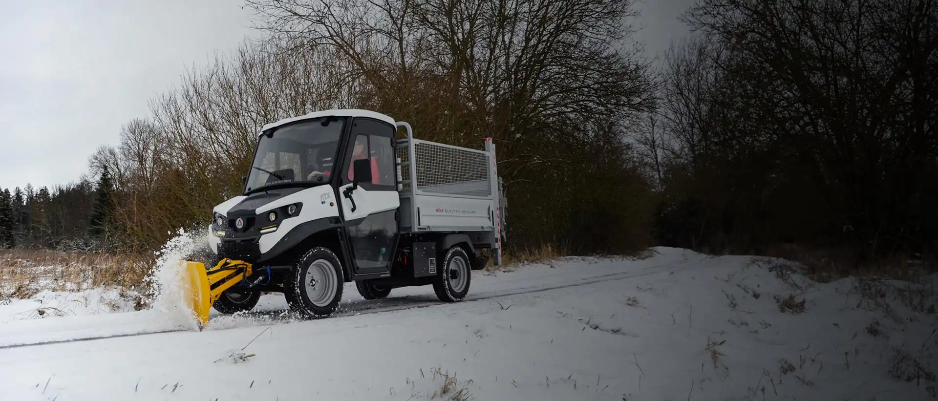 Electric snow plow vehicles