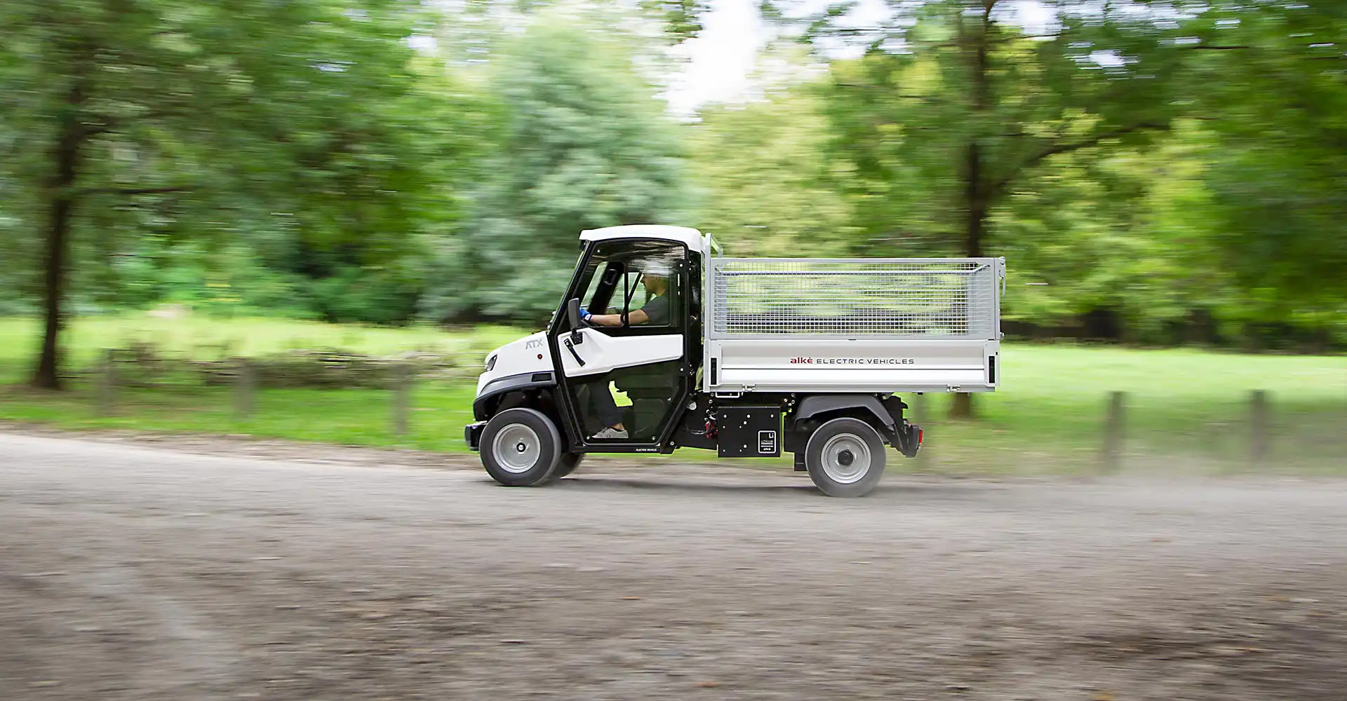 Utility vehicles with steel mesh sides