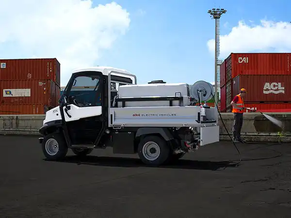 Vehicle with high pressure washer