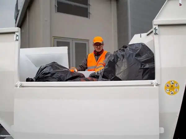 Waste body side door